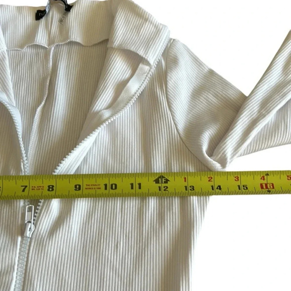 White jumpsuit,layering ,apres ski,bodycon sculpting,ribbed,mock neck,NWT”,125$ - Picture 15 of 15